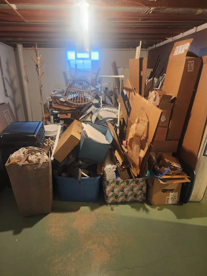 Roll-off dumpster container at job site for Yard Waste Dumpster Rental in Pine Creek